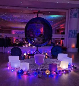 a sound bath in a colourful room
